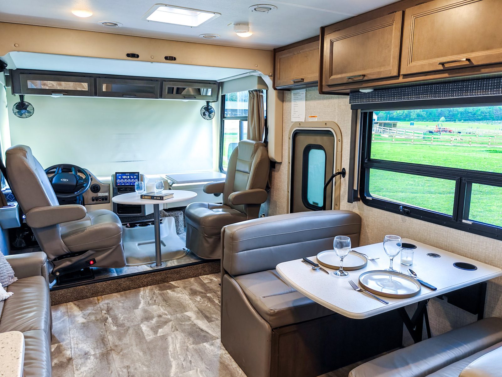 Fully set-up motorhome interior with a Tennessee pasture view